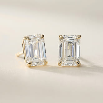 custom emerald cut diamond stud earrings in yellow gold